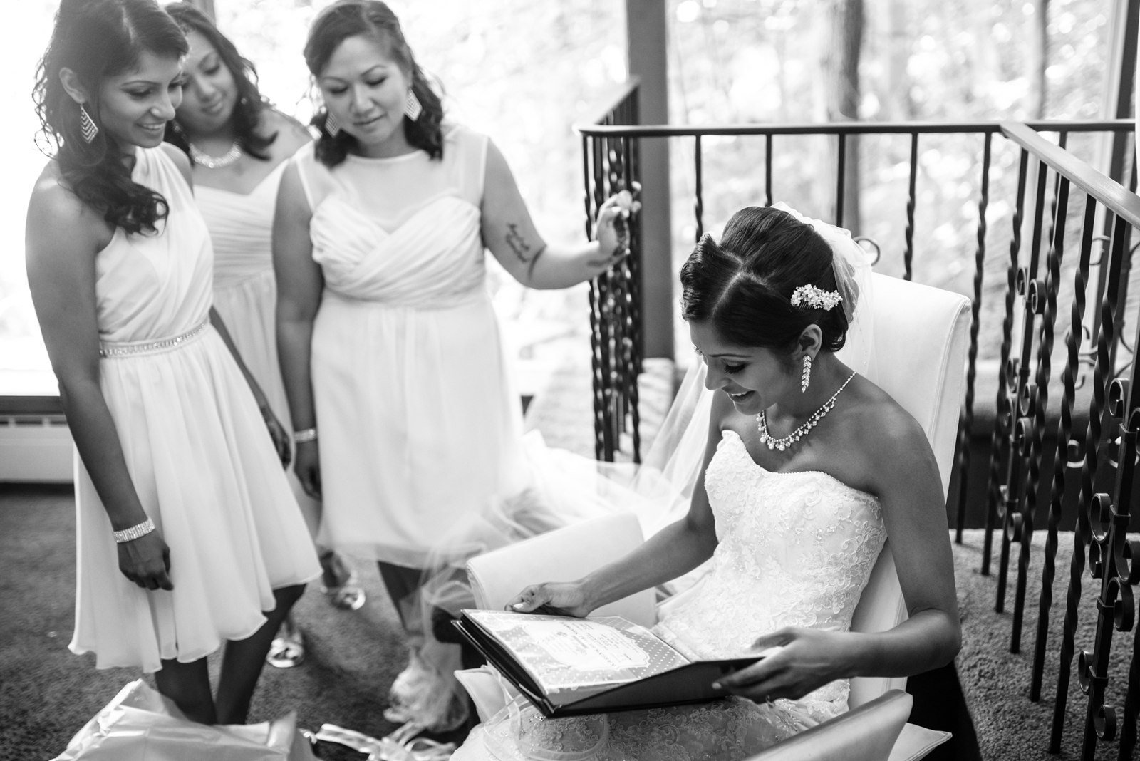 the bride is reading the gift album