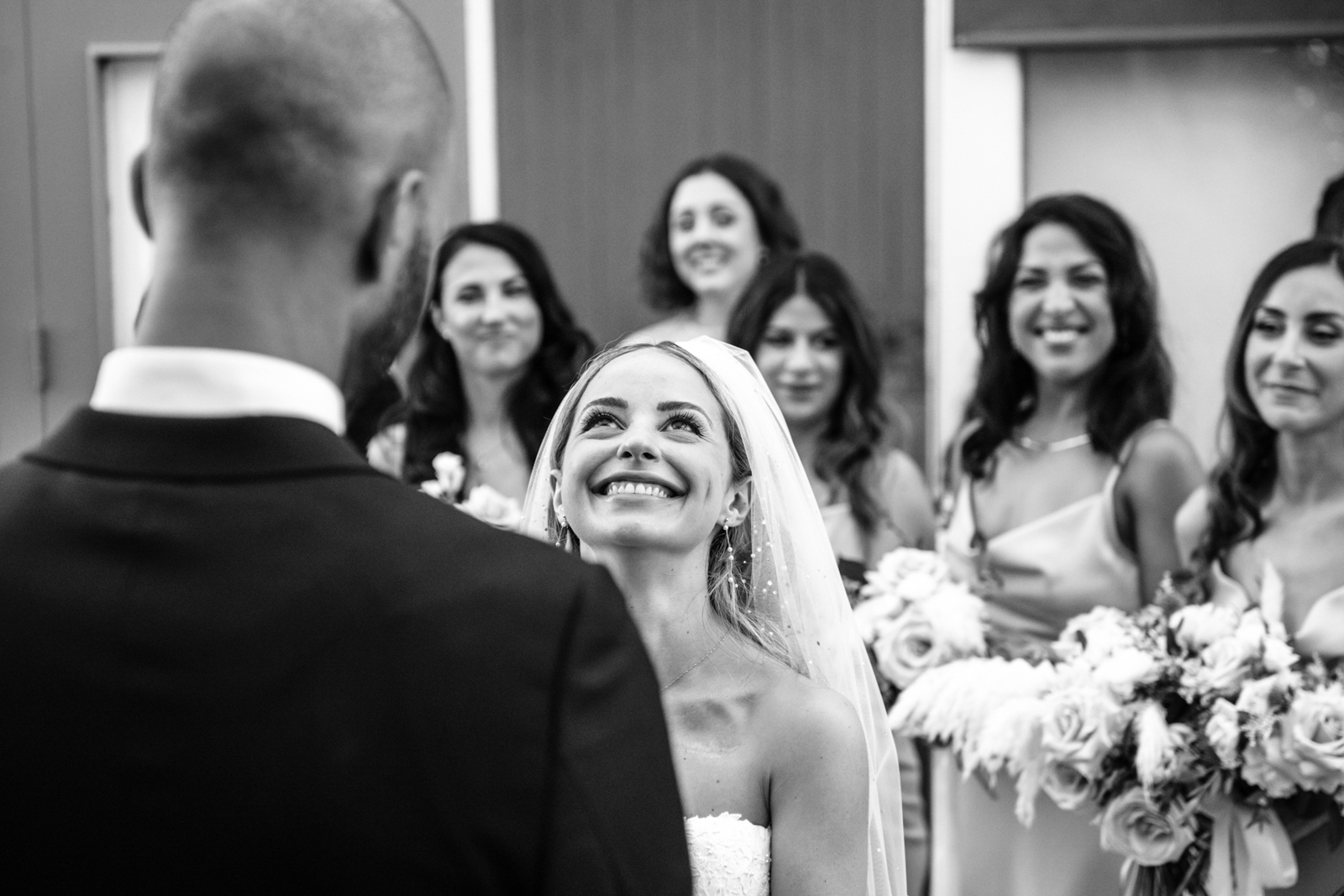 the bride is laughing at the ceremoony